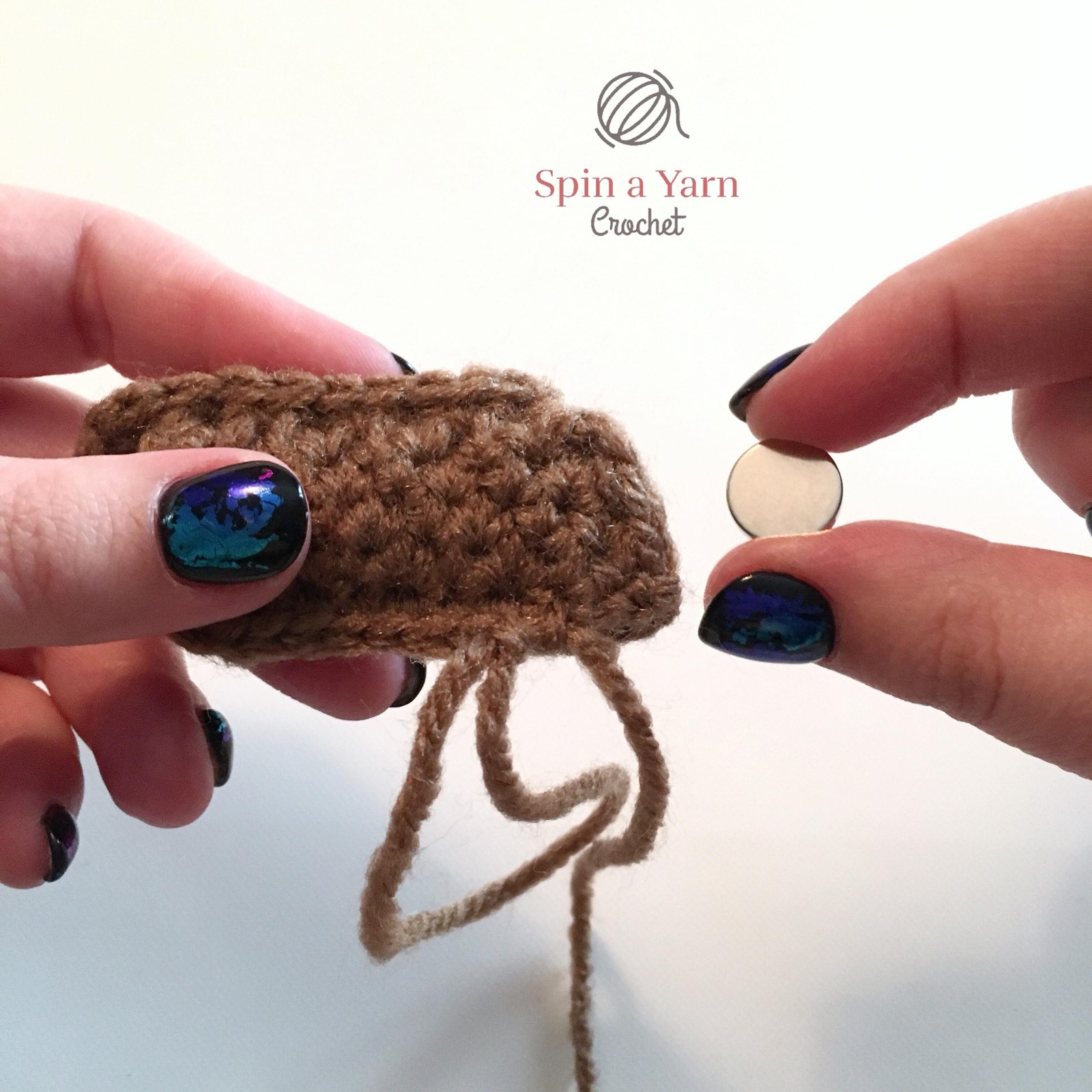 Crochet brown otter body panels showing flat tapered tail and rounded head