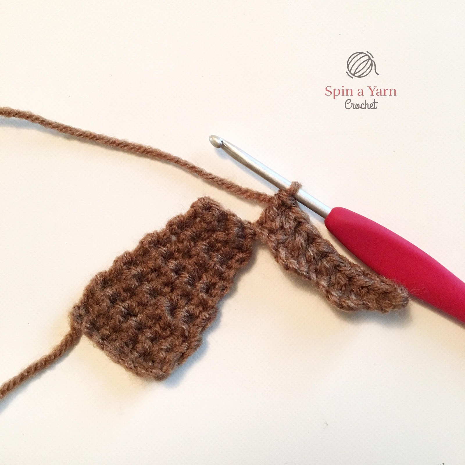 Single crocheting otter panels together around edge and stuffing