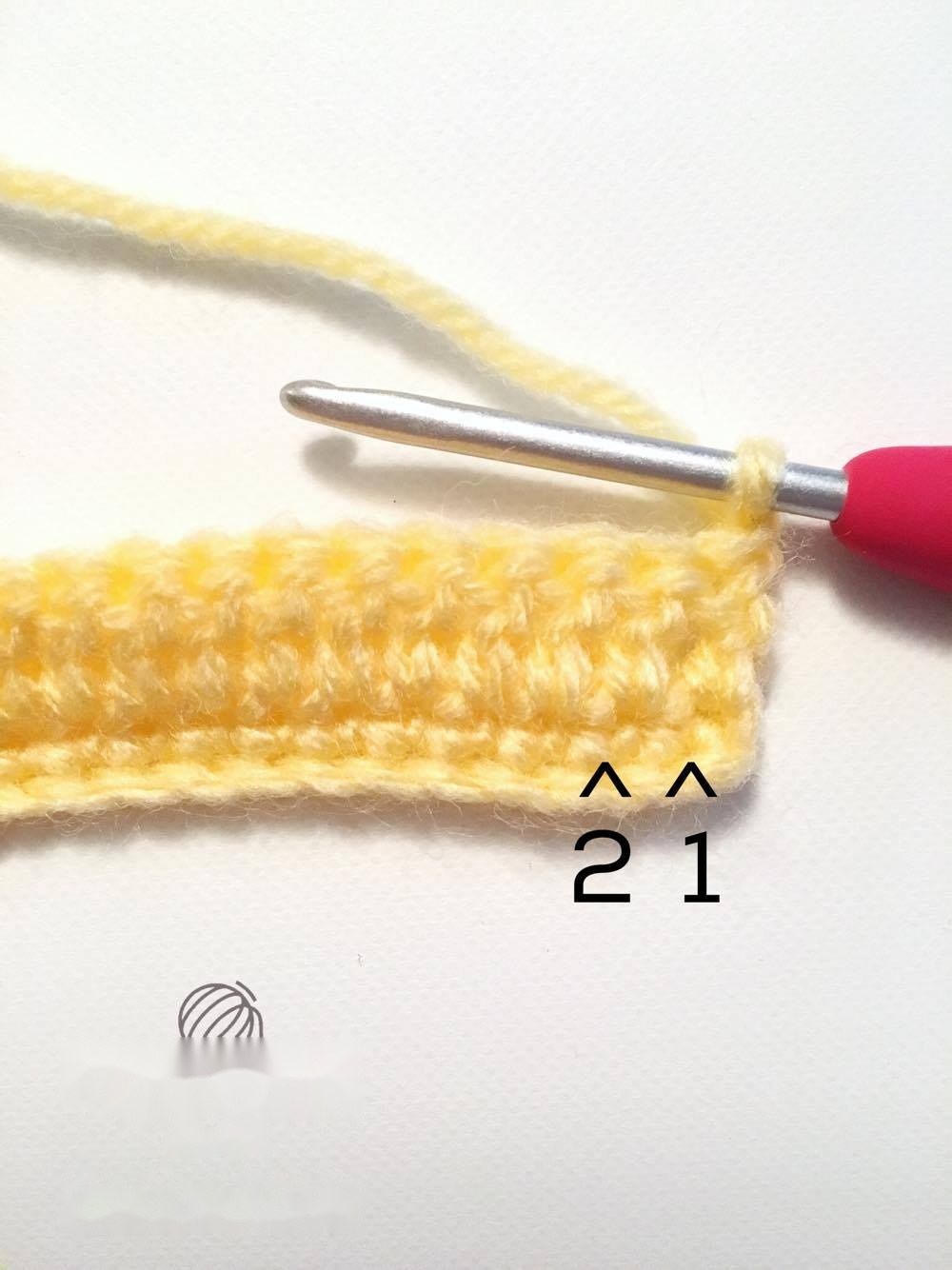 Crocheted yellow pineapple body panel showing textured diamond bumps