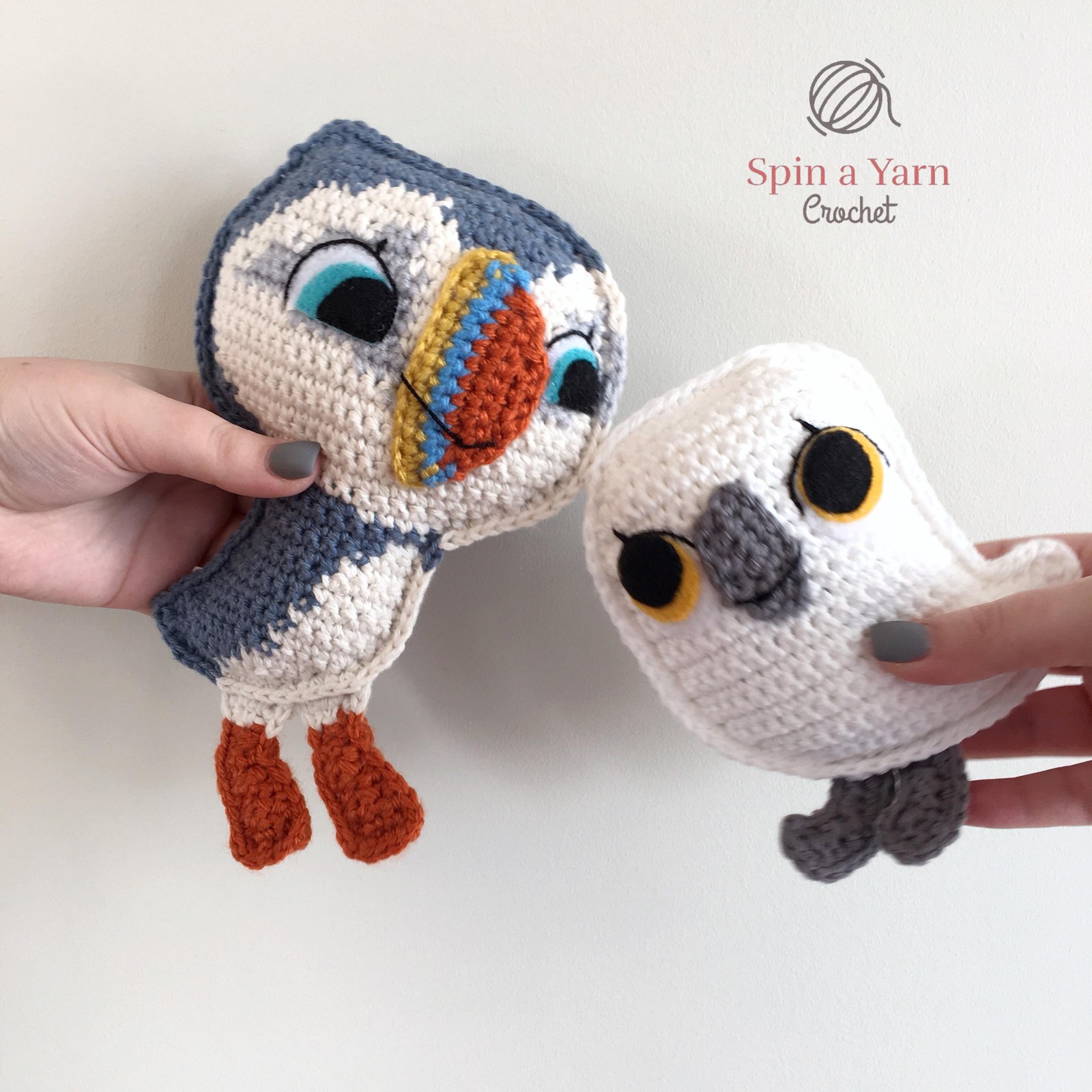 Orange and yellow triangular crochet beak with safety eyes on white mask