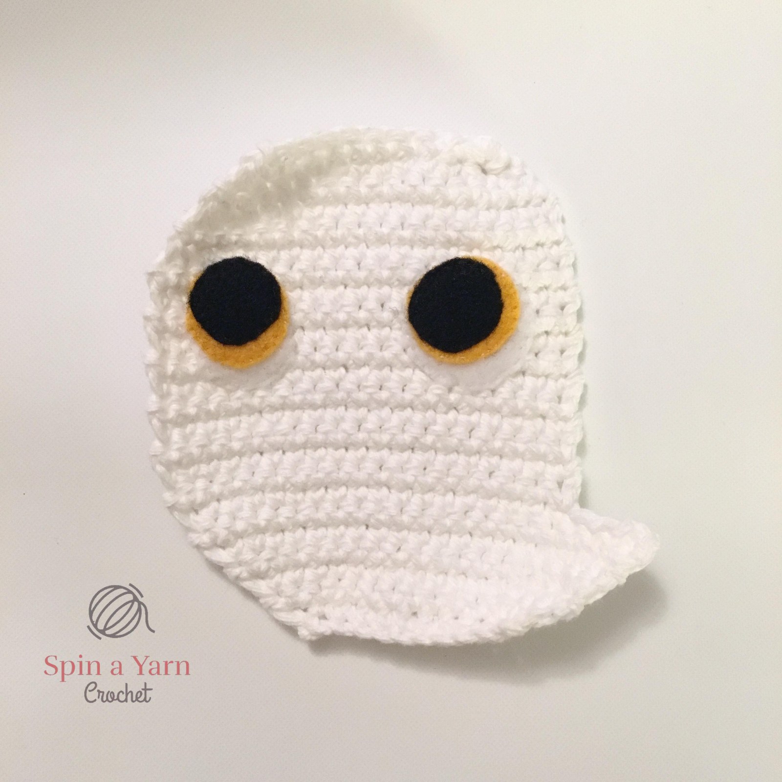 Single crocheting puffin panels together, inserting webbed feet, and stuffing