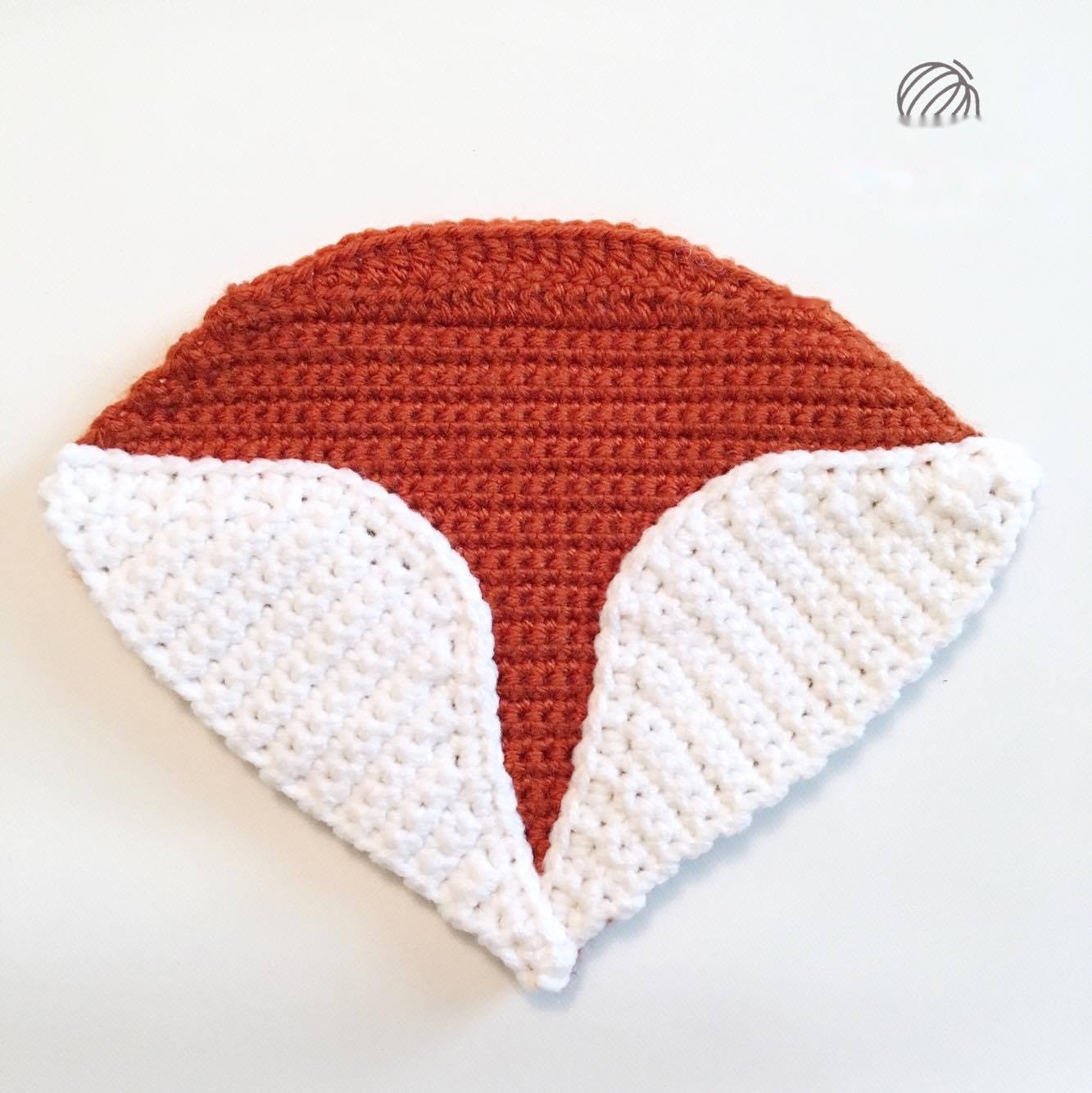 Crochet black-tipped fox ears, black paws, and bushy orange tail with white tip