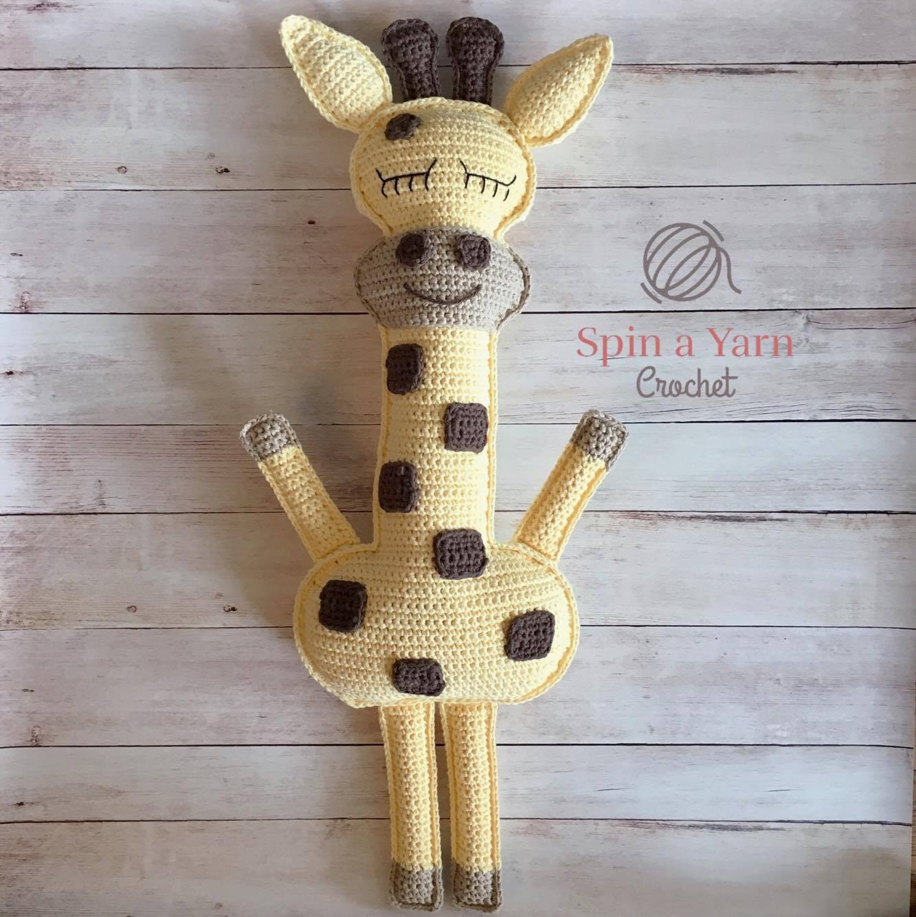 Crochet yellow giraffe body panel showing wide base and long slender neck