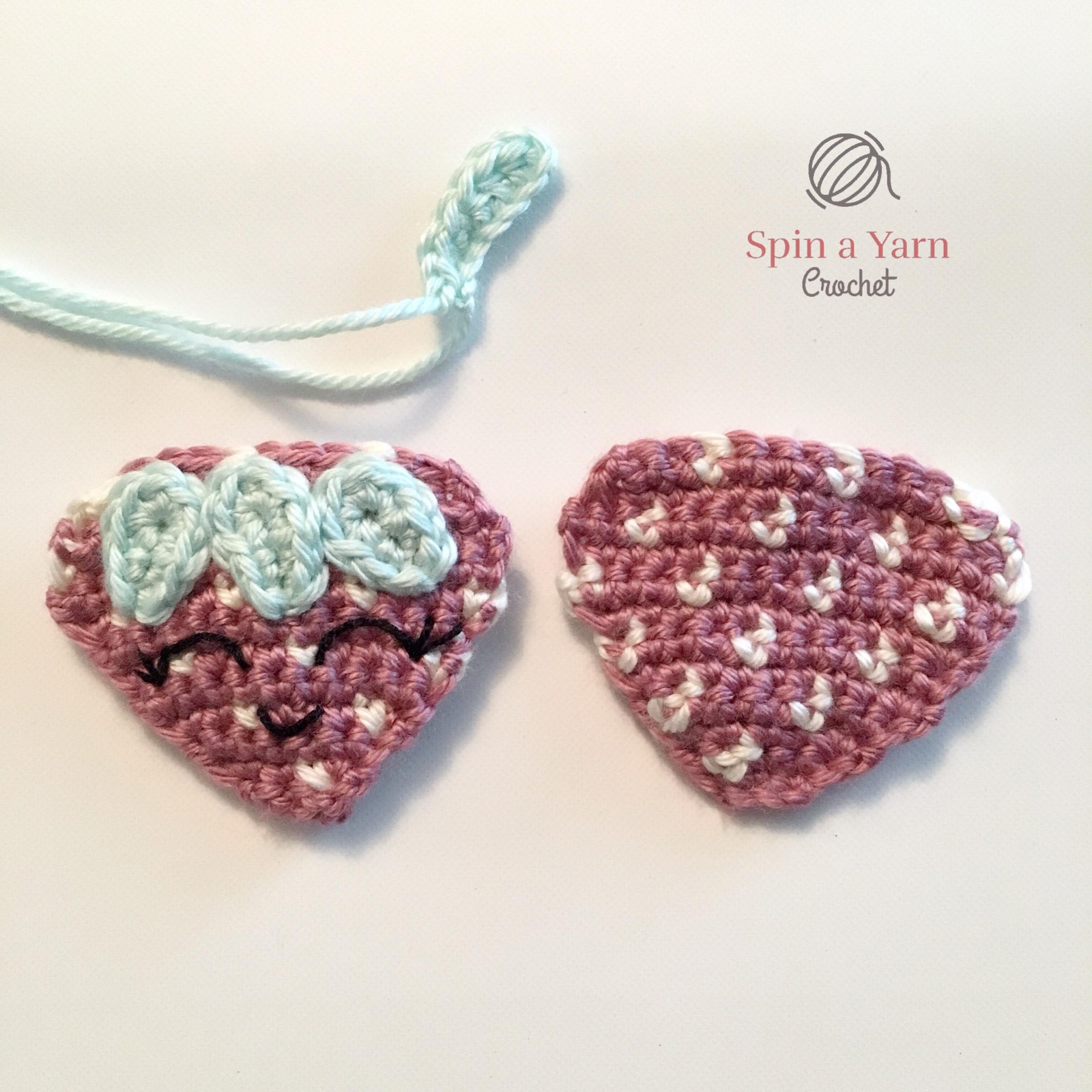 Crochet strawberry pieces before assembly
