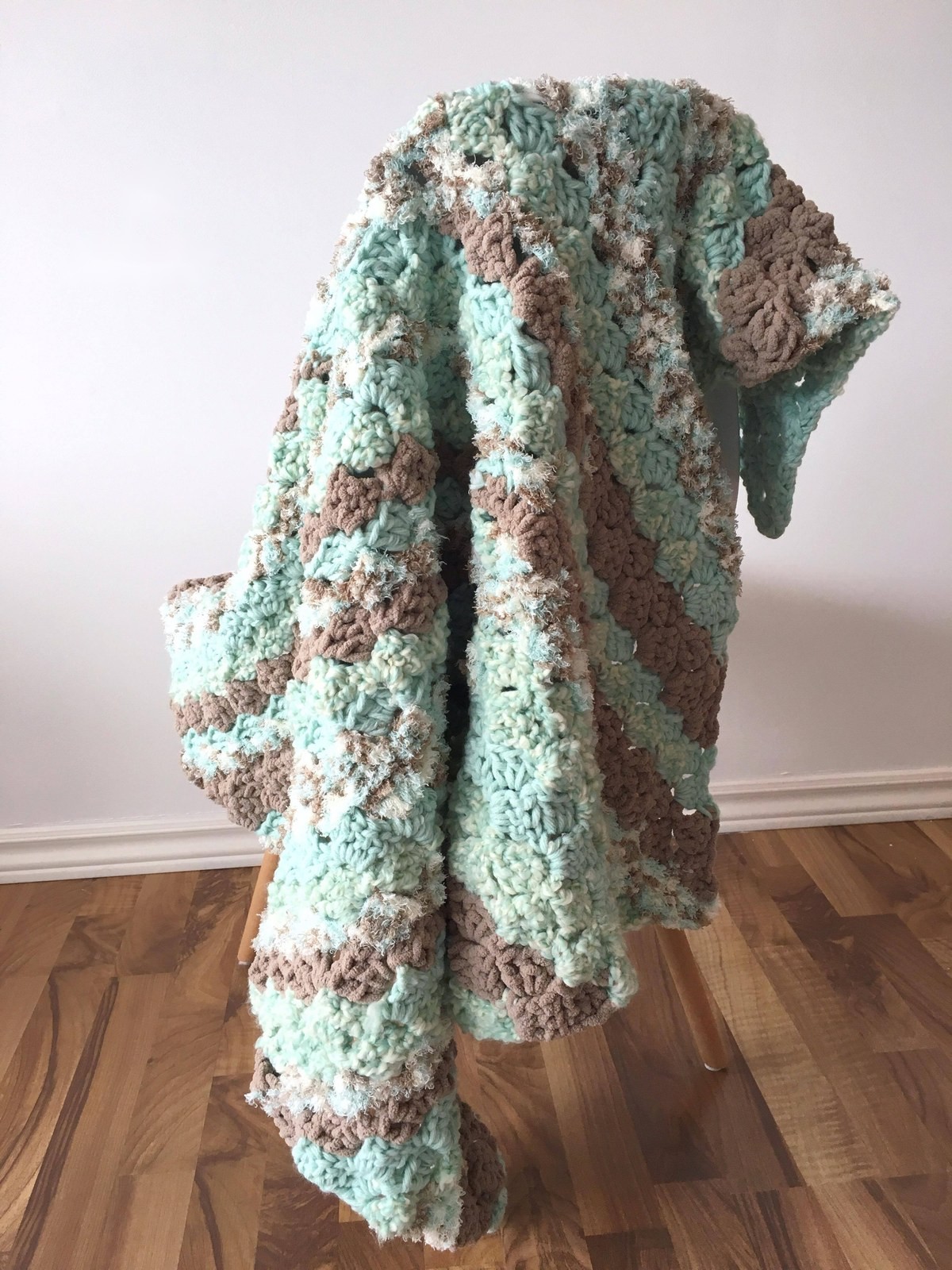 Blanket draped on chair