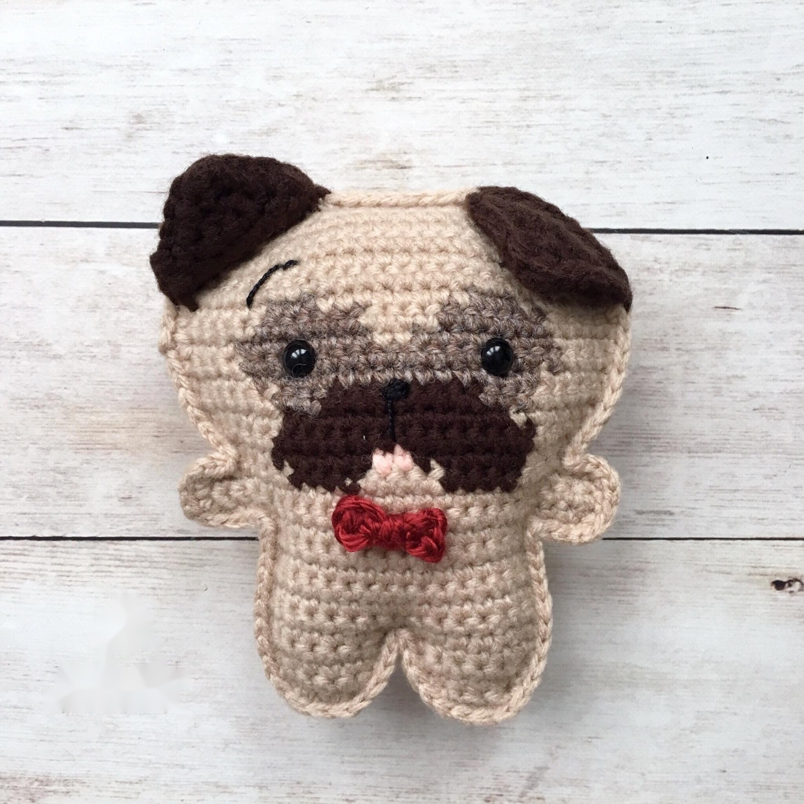 Crochet pug with one ear up
