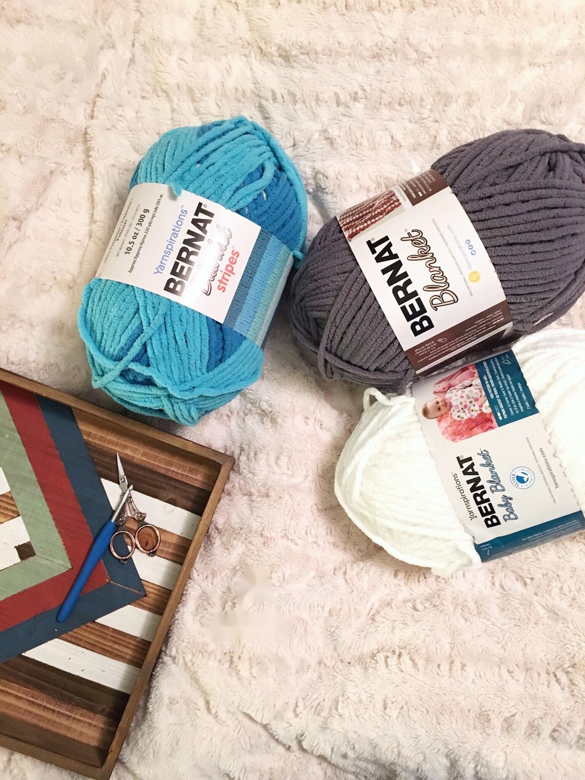 Three skeins of Bernat Blanket Yarn