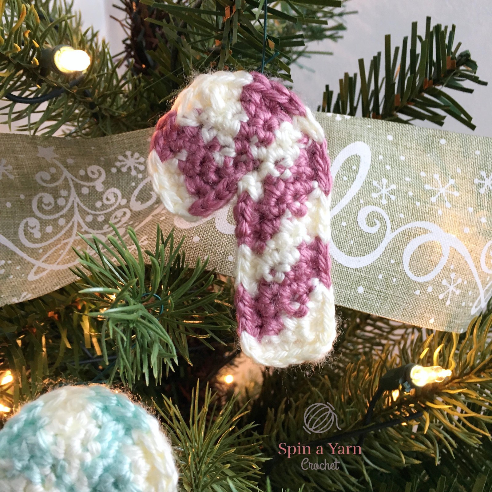 Candy cane ornament on tree