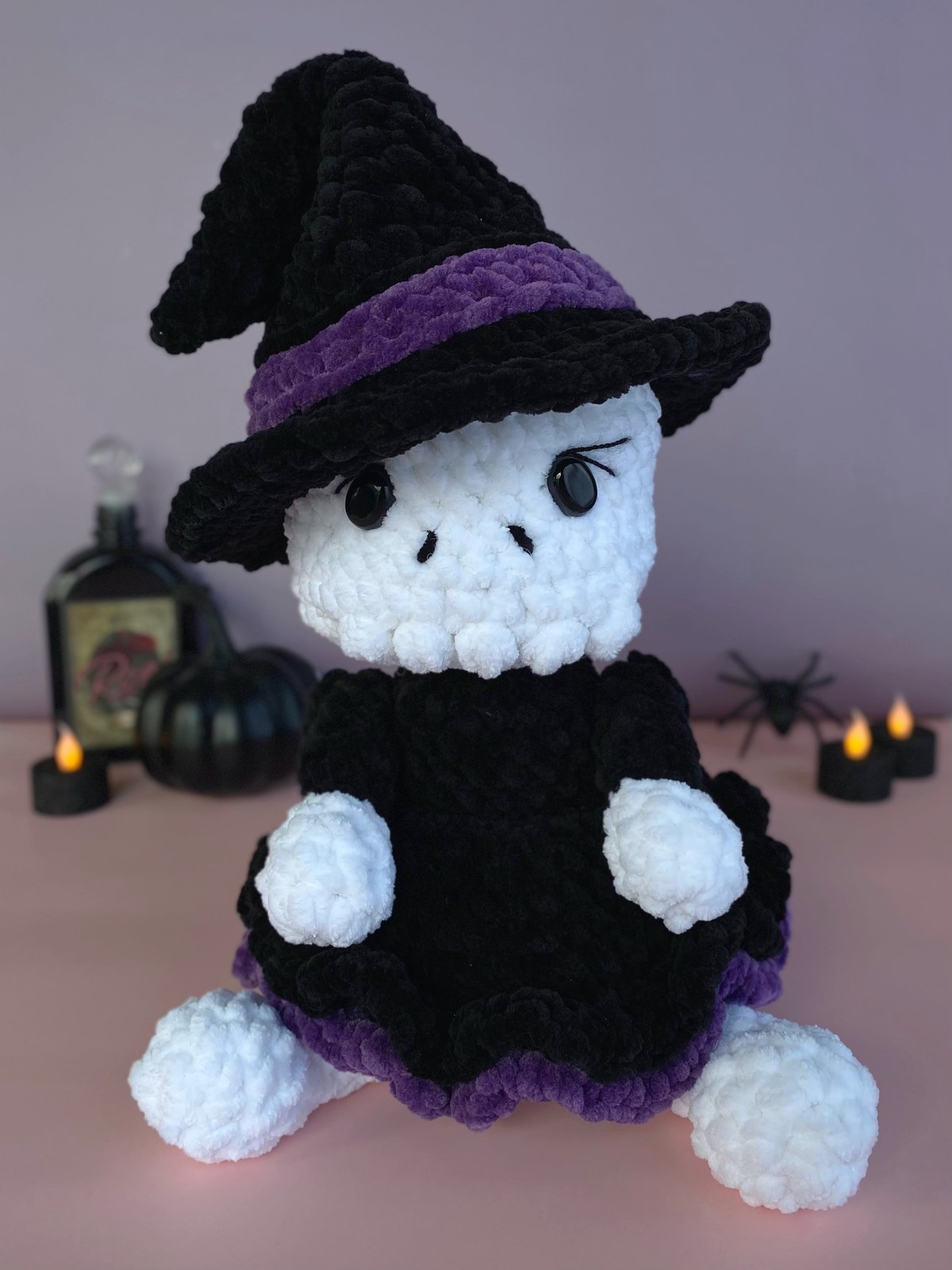 Finished Witch of the Dead amigurumi with crooked hat and layered ruffle skirt